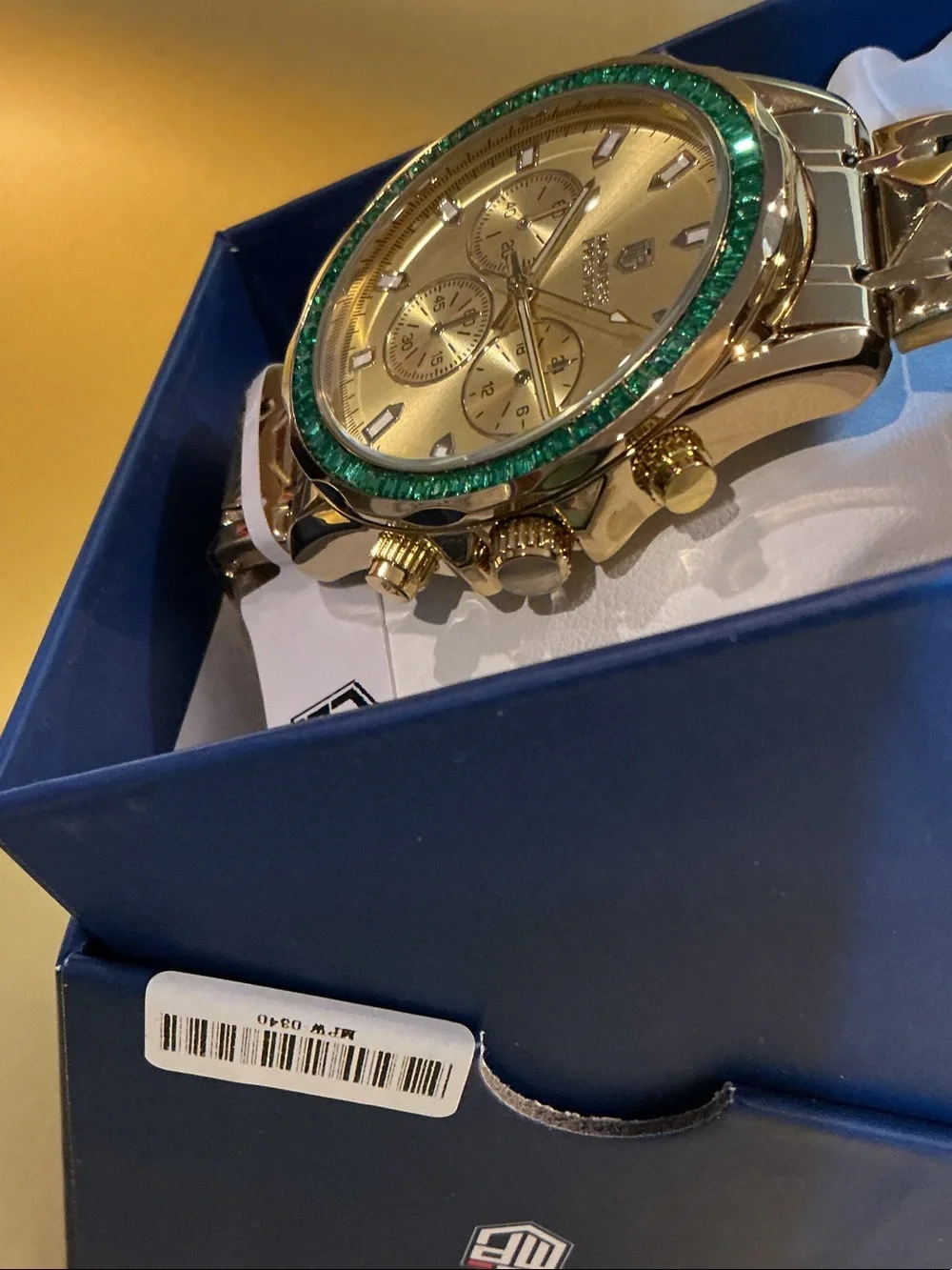 Invicta Gold Tone Watch with Green Bezel
